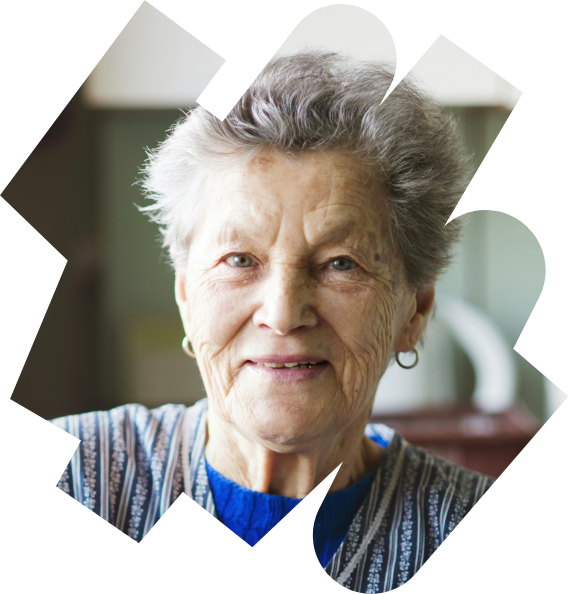 An elderly woman smiling